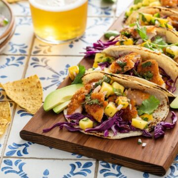 Fish tacos with mango salsa and red cabbage