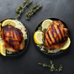 Grilled chicken legs. Grilled BBQ chicken legs with sesame and parsley