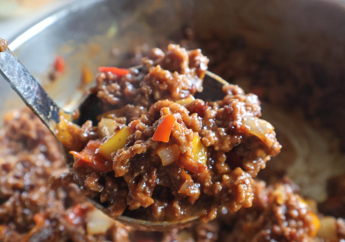 Ladle with sloppy joe mixture.