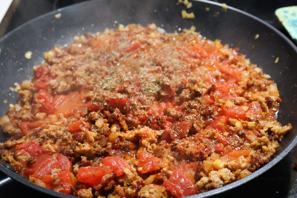 Meat browning in the pan.