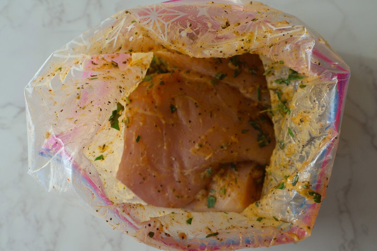 chicken and marinade in a zip lock bag.