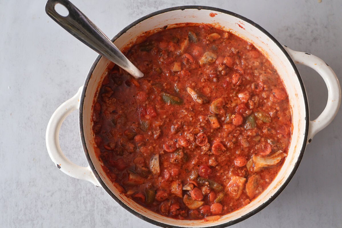 chili in a pot with a ladle.