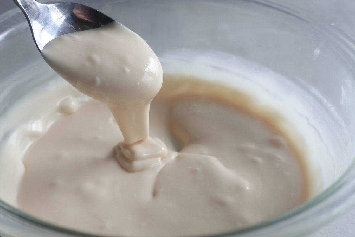 Bailey's Irish Cream glaze with a spoon.