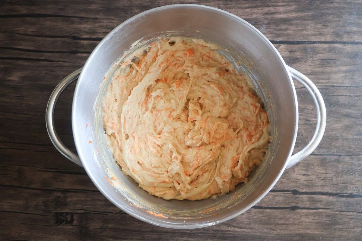 Carrot cake pound cake batter in a mixing bowl/