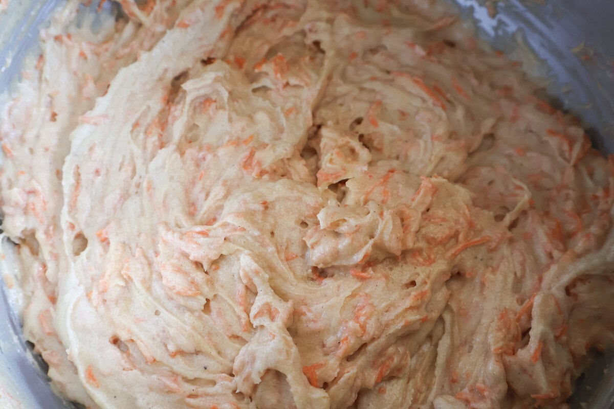 carrot cake pound cake ingredients mixed together.