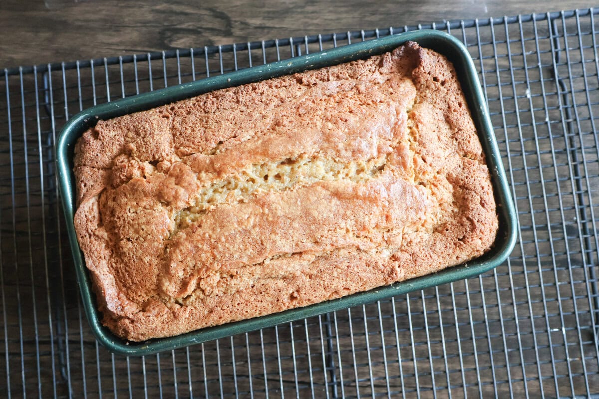 baked carrot cake pound cake on a wire rack.