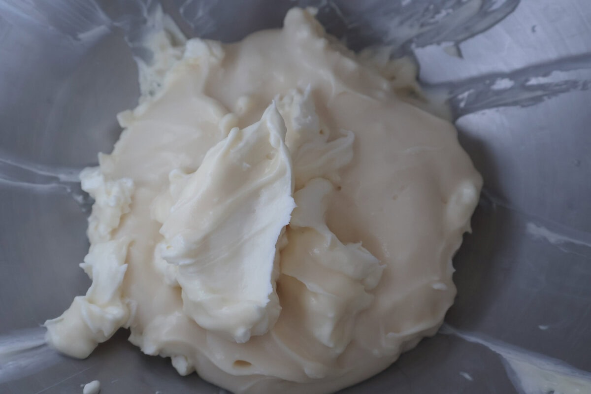 Cream cheese in a mixing bowl.
