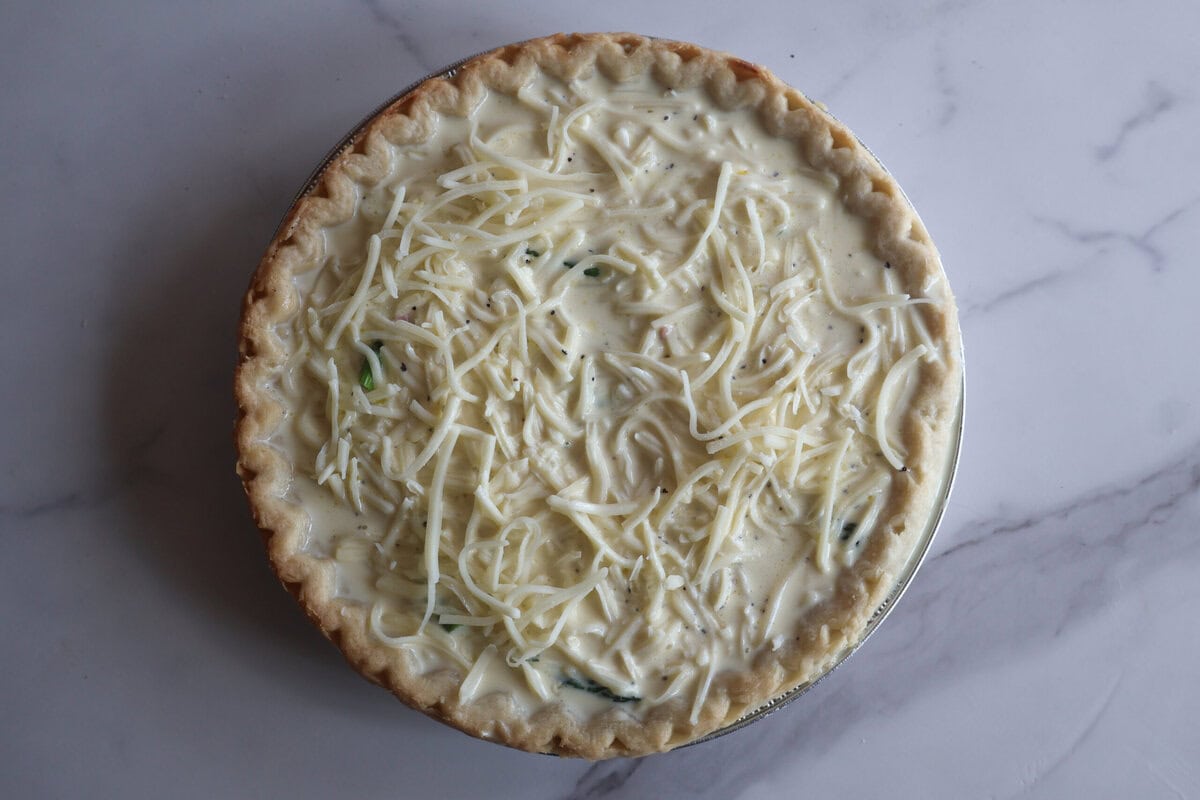 Filling for the quiche with cheese added.