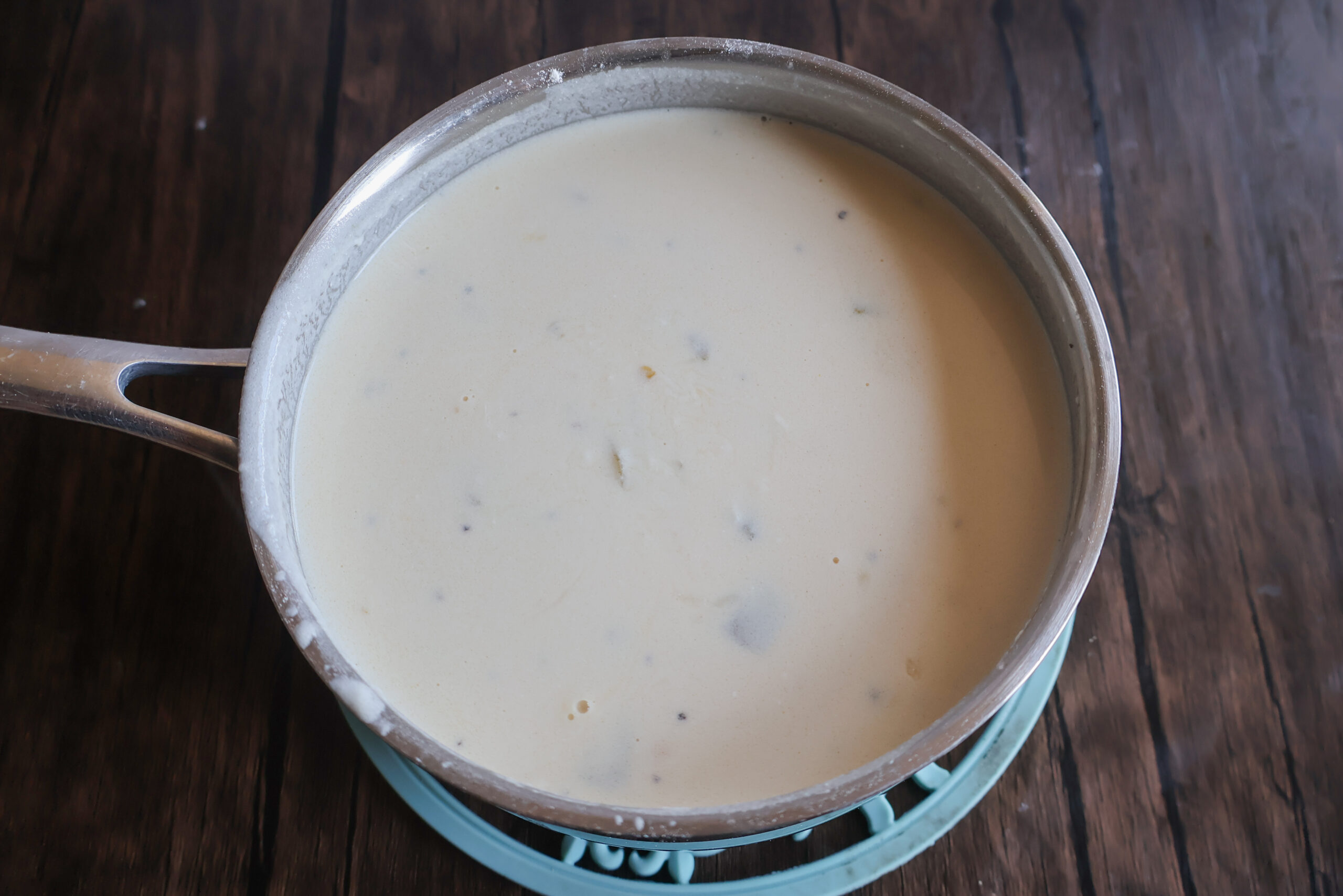 Sour cream sauce in a pot.