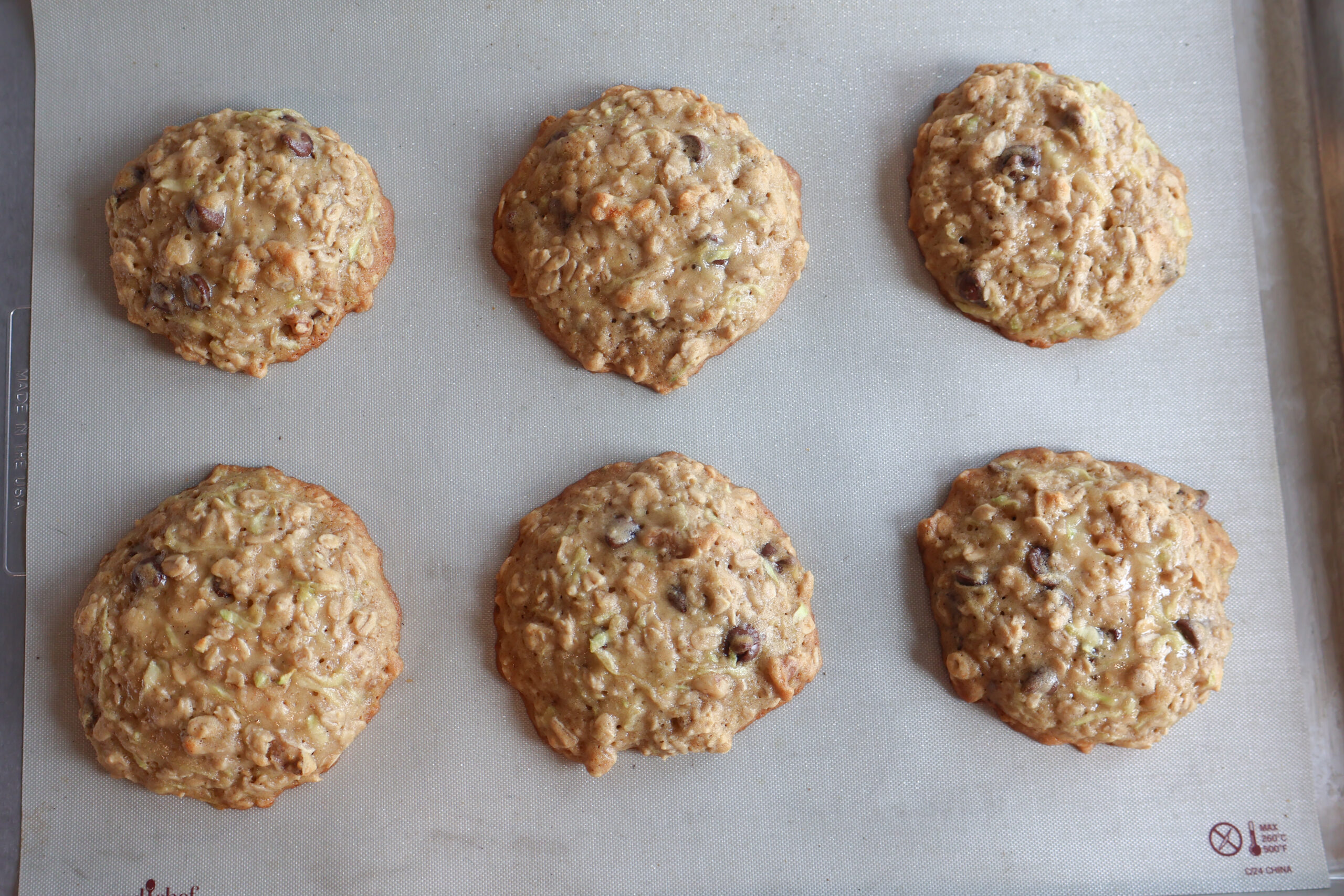 Baked Zucchini Breakfast cookies in a baking sheet.