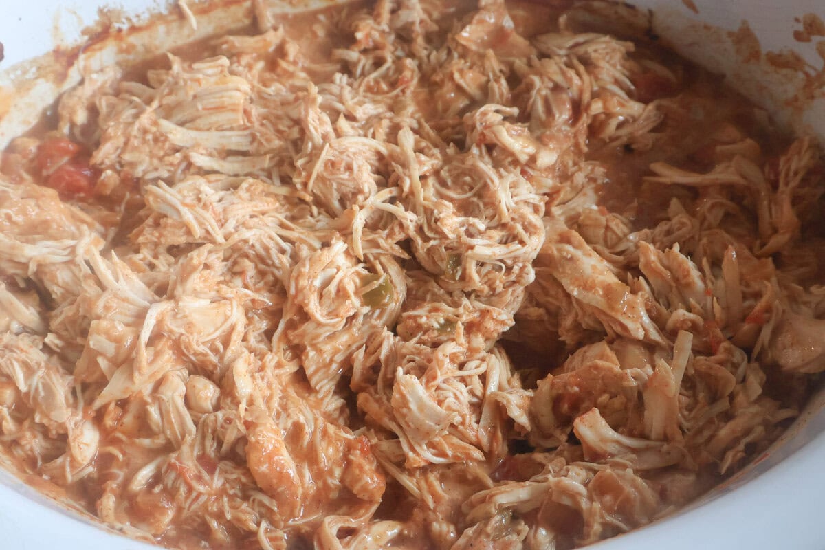 Crockpot chicken tacos finished with all ingredients.