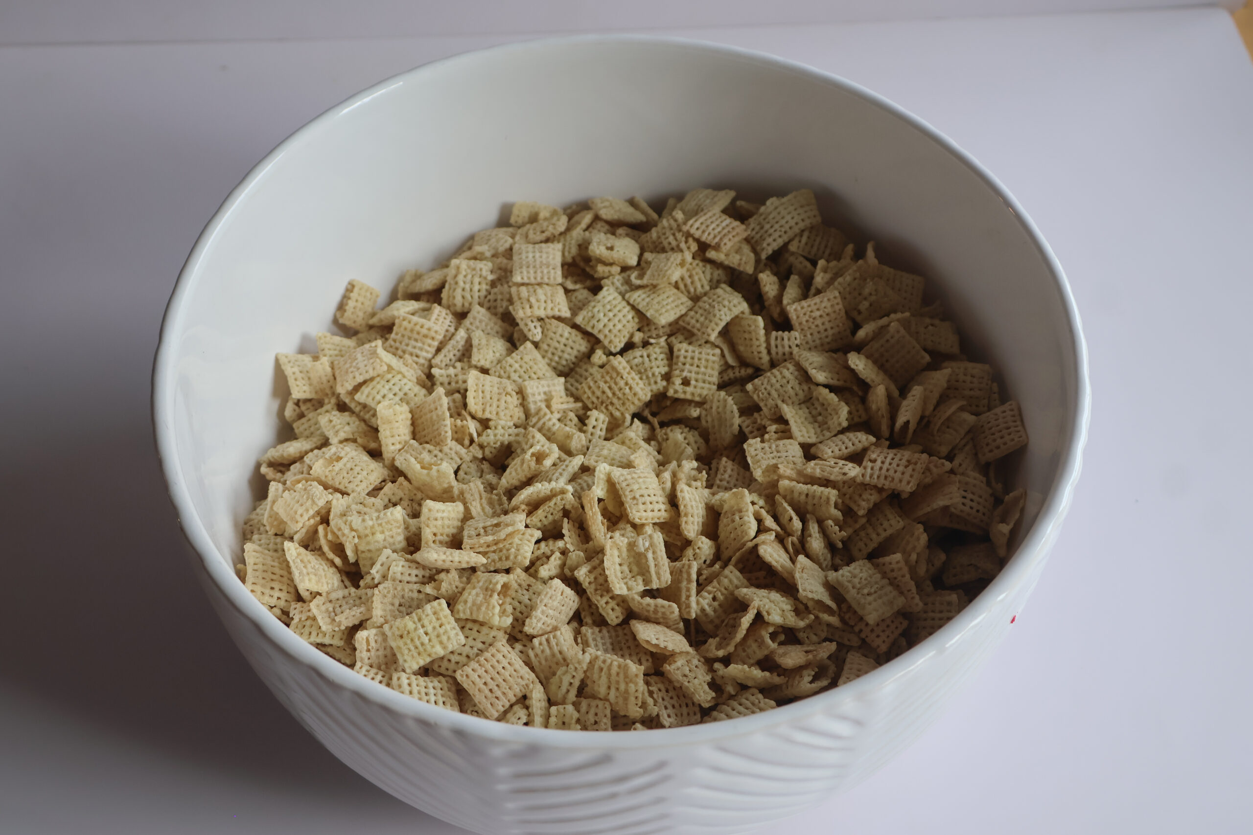 cereal mixed in a white bowl.