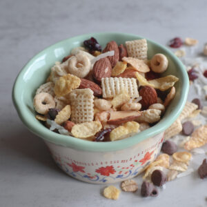 sweet and crunchy cranberry almond trail mix in a small bowl.