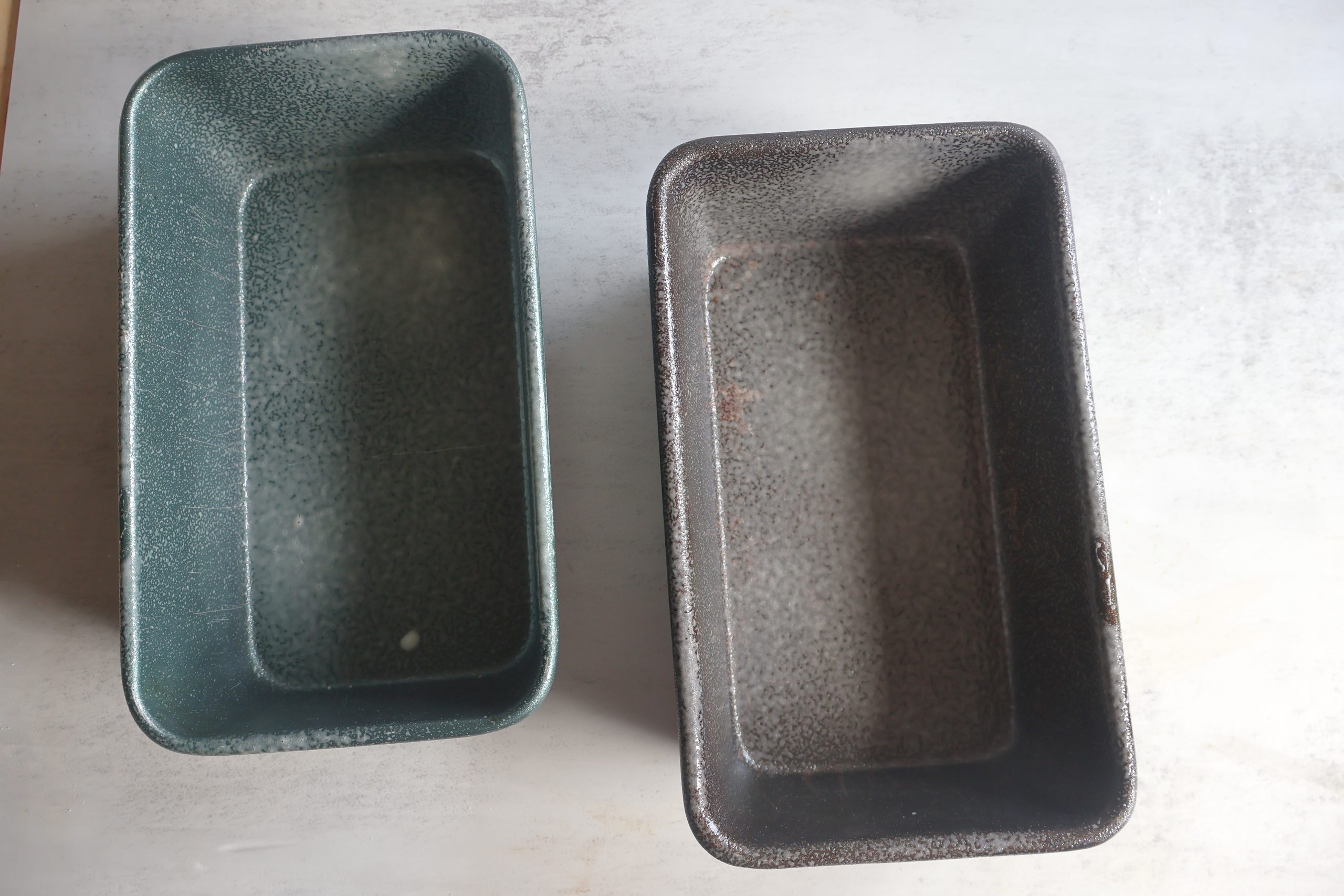 Two greased loaf pans.