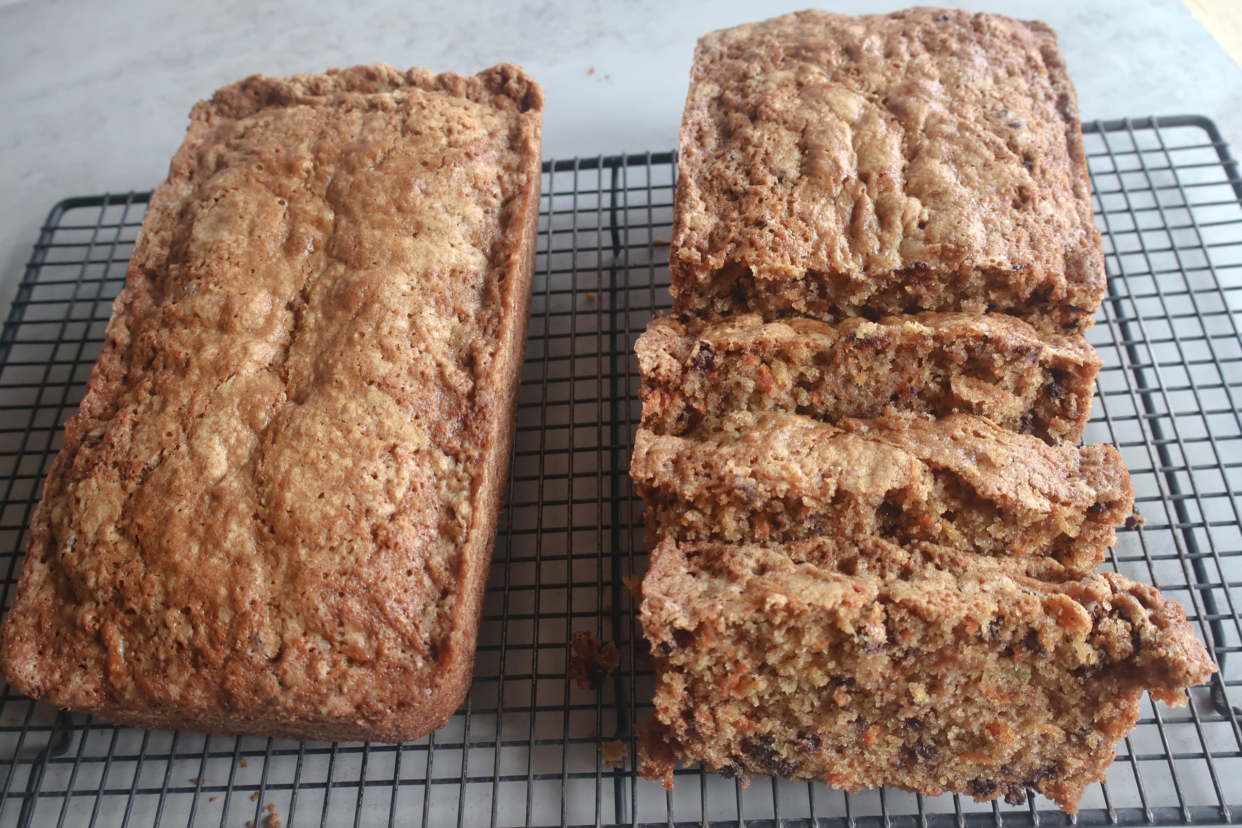chocolate chip zucchini carrot bread on a cooling rack.