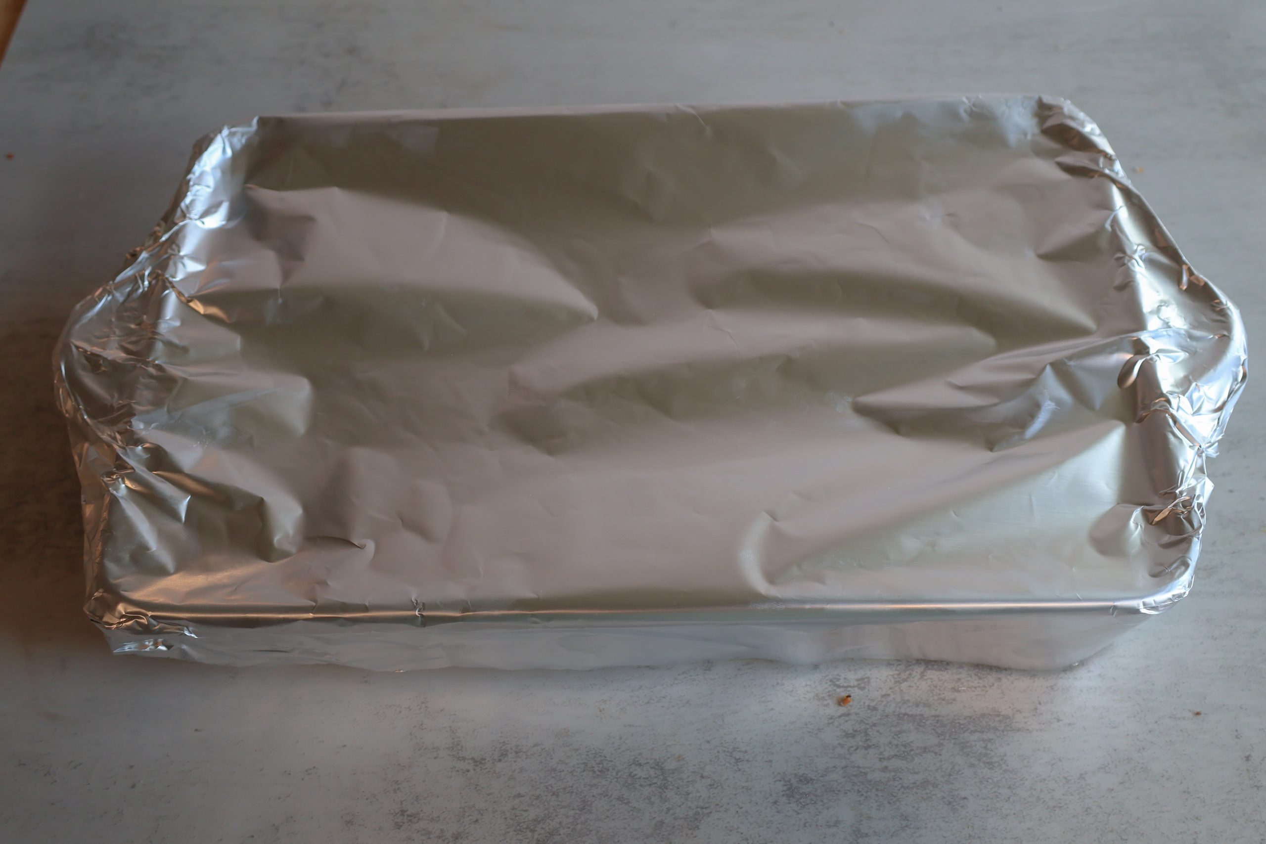 Casserole dish covered in foil.