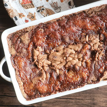 apple cake in a white dish.