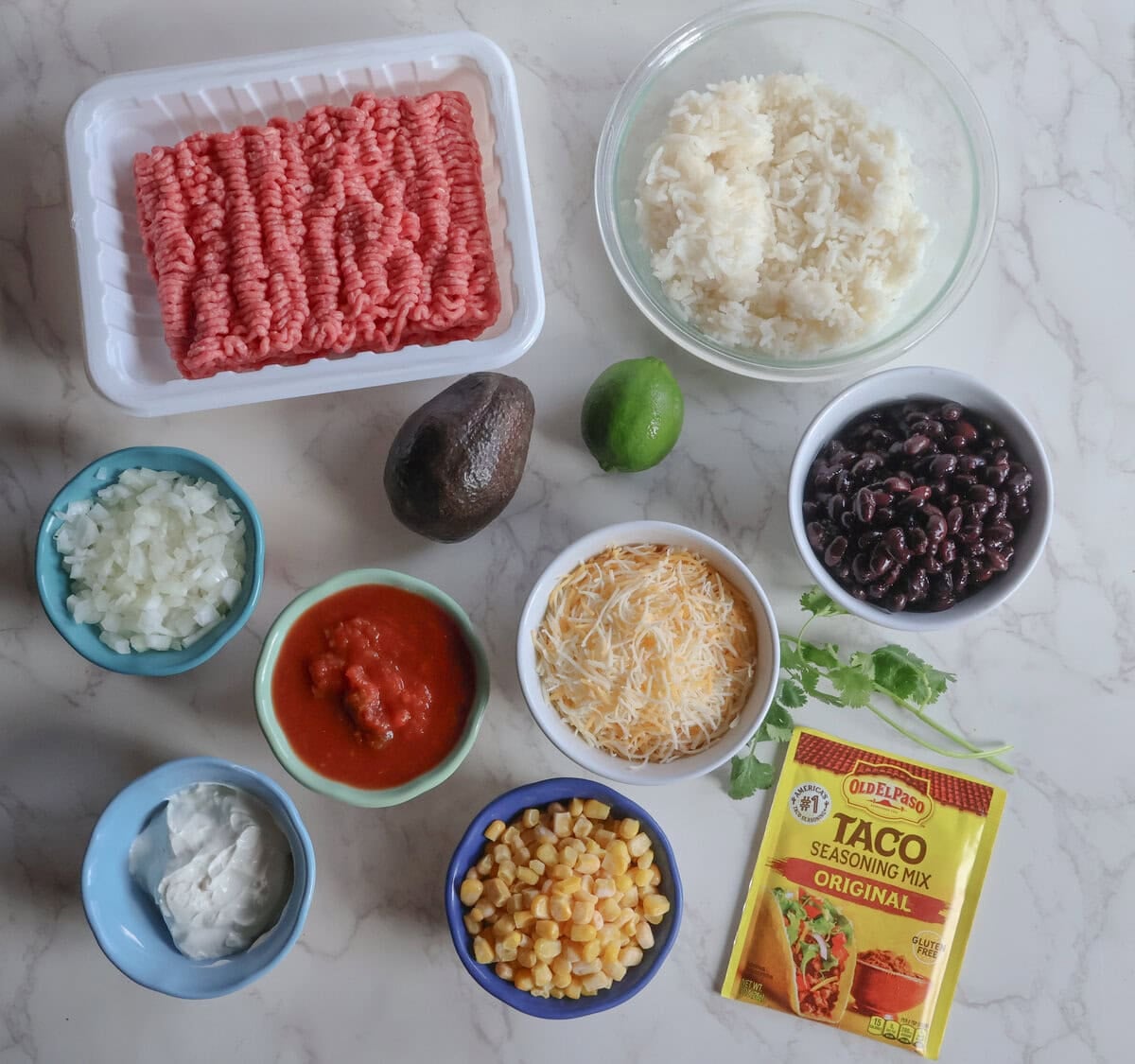Ingredients for the cheesy mexican beef and rice casserole.