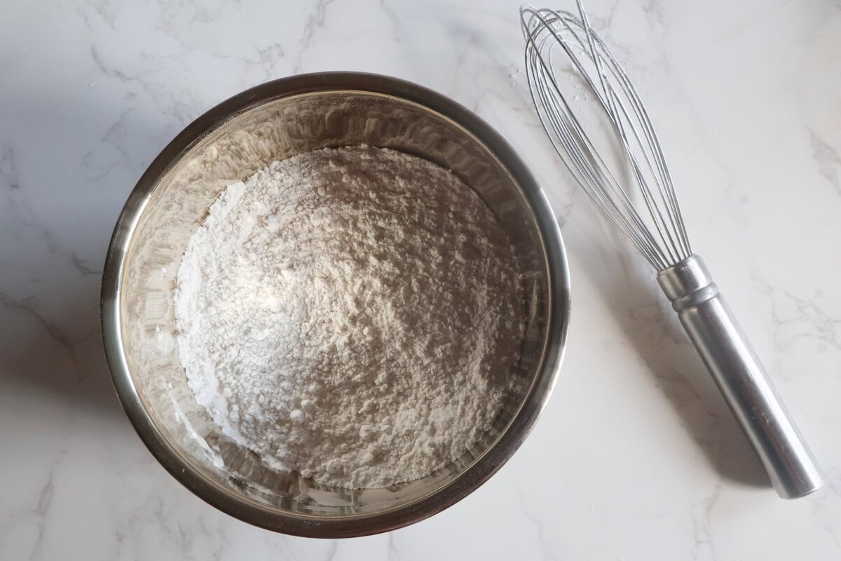 dry ingredients mixed together in a metal bowl.