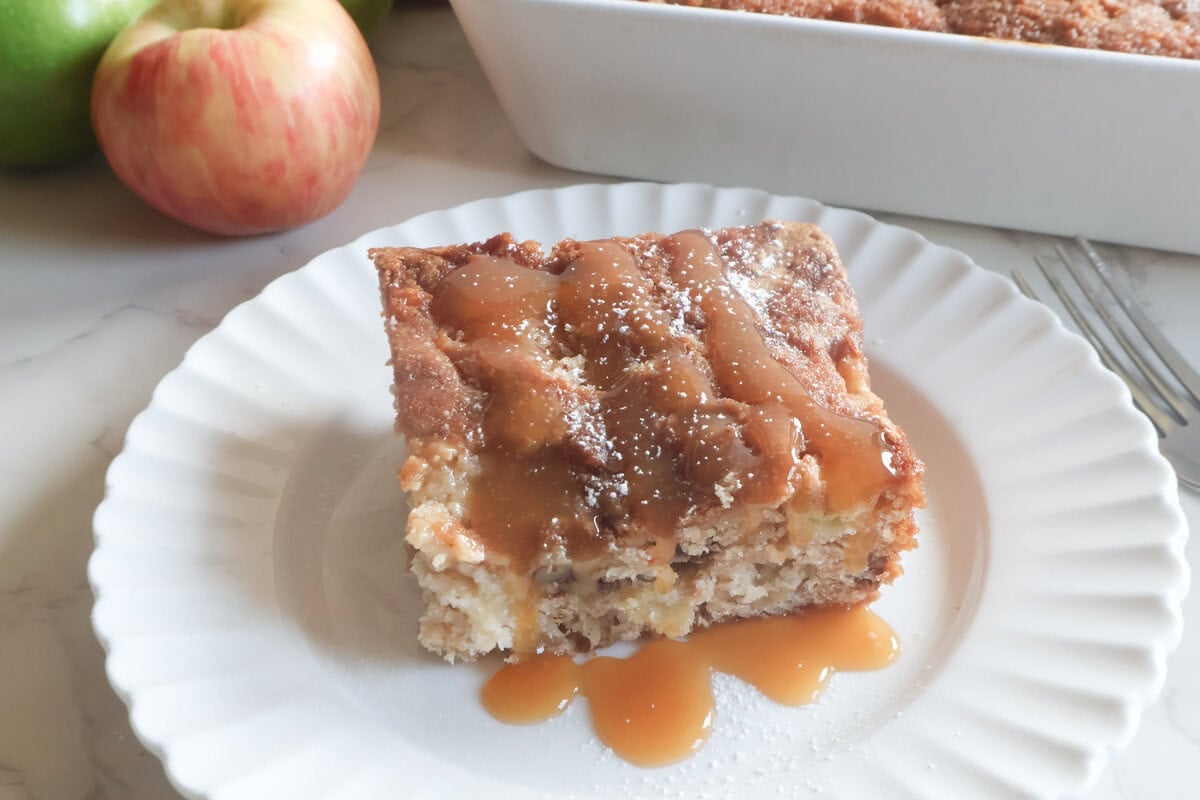 slice of apple cake with caramel drizzle.