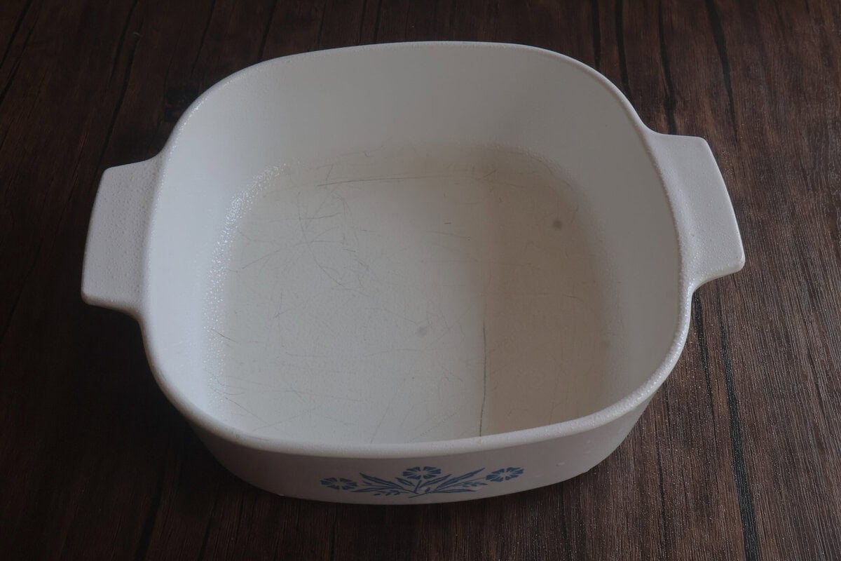 Greased dish for caramel apple dumplings.
