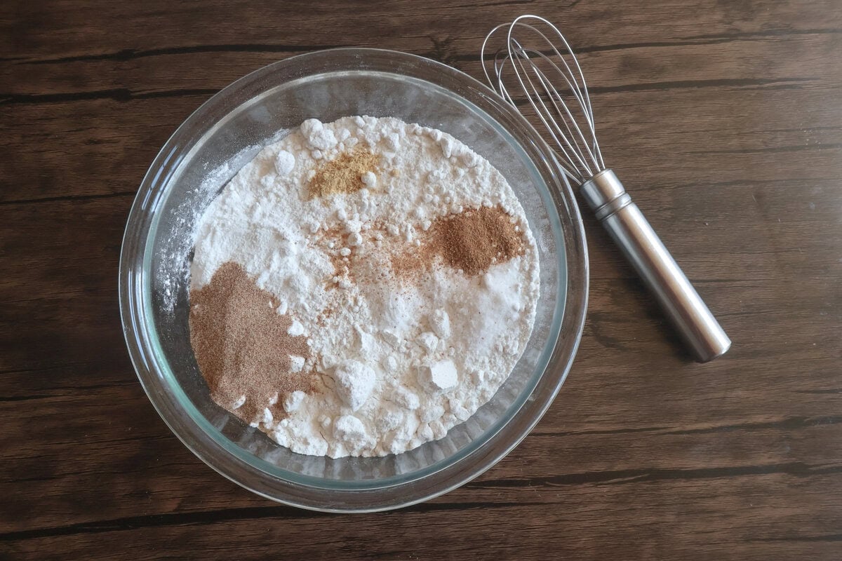 dry ingredients for the apple cider donut muffins in a bowl.