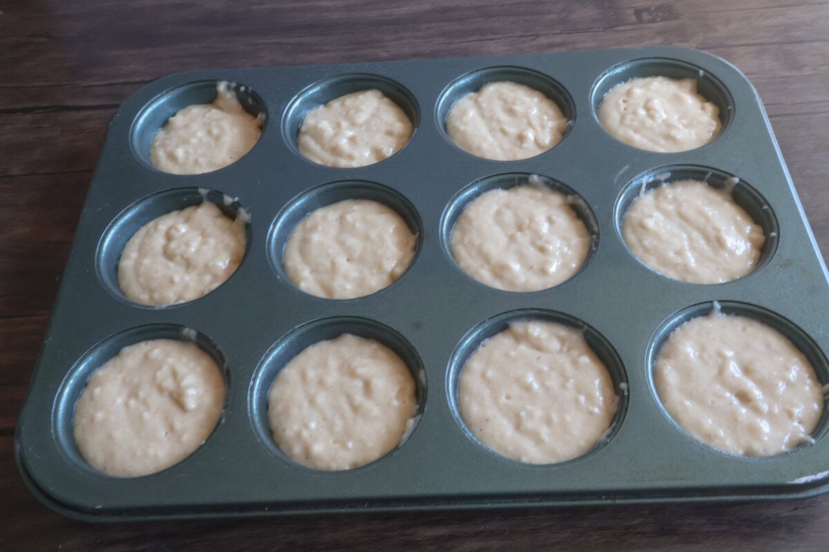 apple cider donut muffin mix in a pan beforre baking.