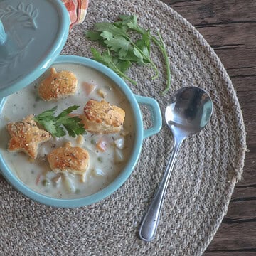 creamy chicken pot pie soup with puff pastry croutons.