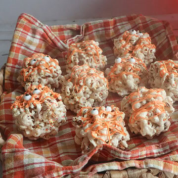 brown butter popcorn balls in a basket.
