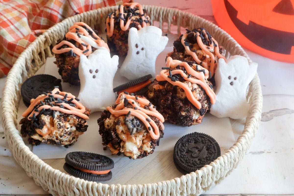 Cookies and cream popcorn balls with ghost peeps and oreo cookies.