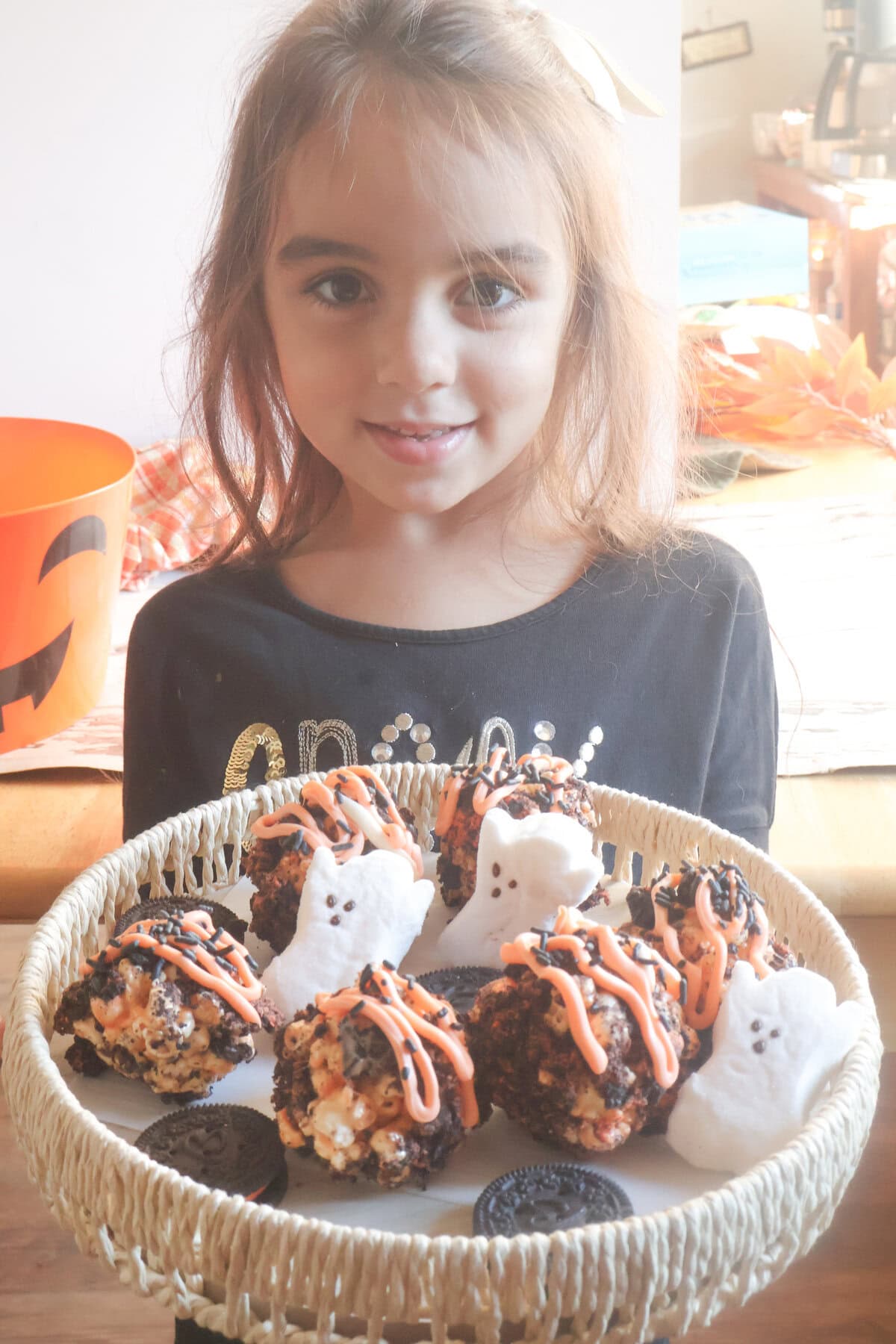 my daughter with the cookies and cream popcorn balls.