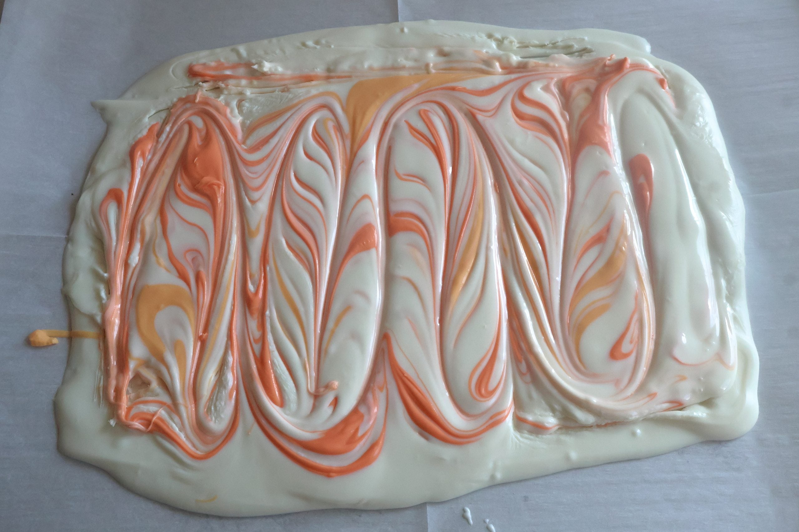 yellow and orange swirled through the white chocolate.